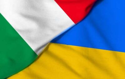 two flags. ukraine and italy.