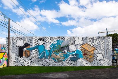 murale di millo ad atene per celebrare calvino