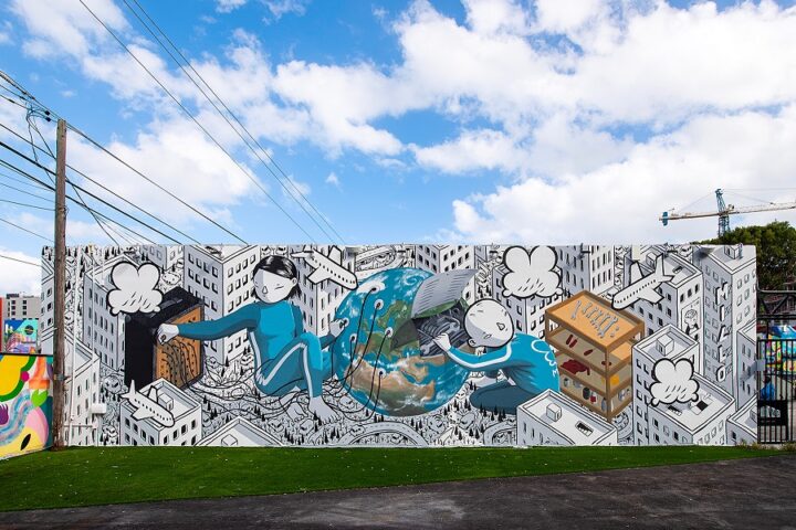 murale di millo ad atene per celebrare calvino