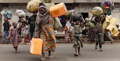people flee fightings in mugini, dr congo